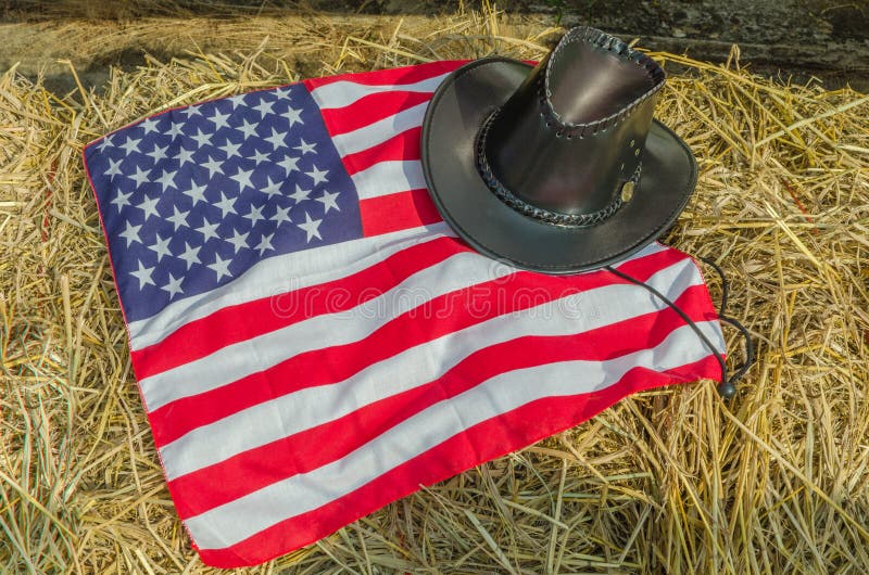 American flag and Cowboy hats On straw