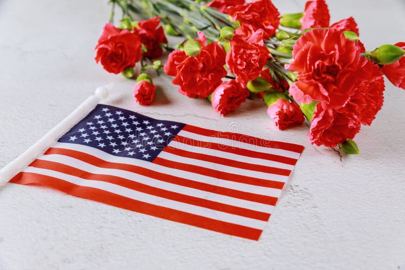 American flag and flowers on white background. Symbol of United States of America.