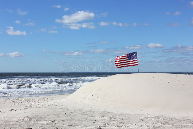 American Flag at the Beach stock photo. Image of flag 108392820