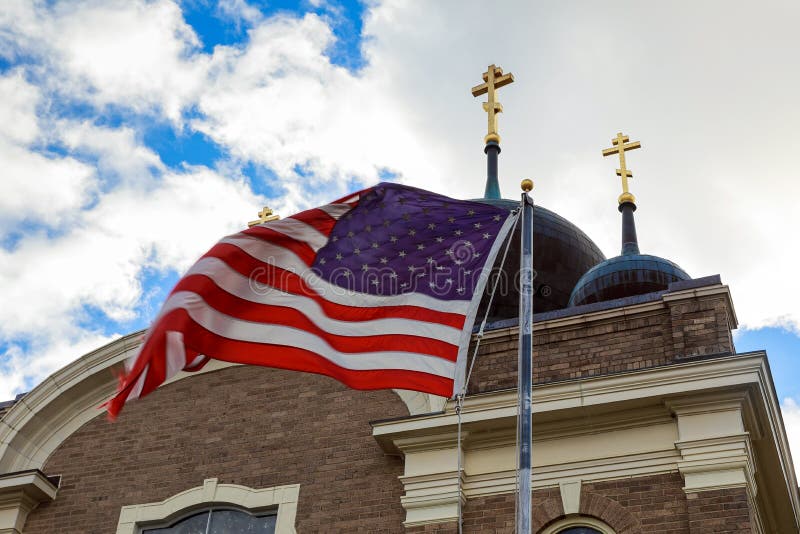 American flag and old church steeple reflect separation of state