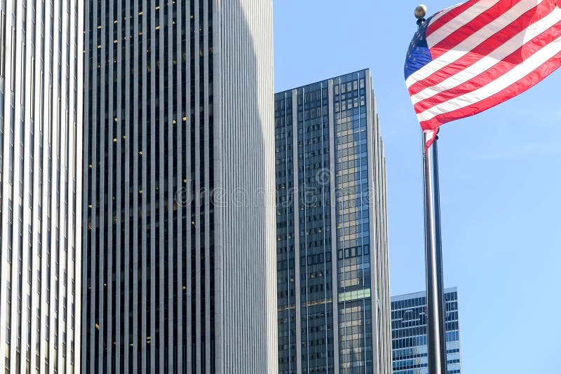 American Flag Waving By New York Skyscrapers Stock Photo - Image of skyscrapers, stars: 77824362