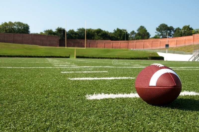 American Football on Field stock photography