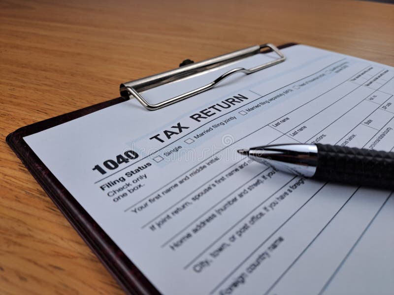 american-tax-return-form-1040-us-individual-tax-return-working-desk