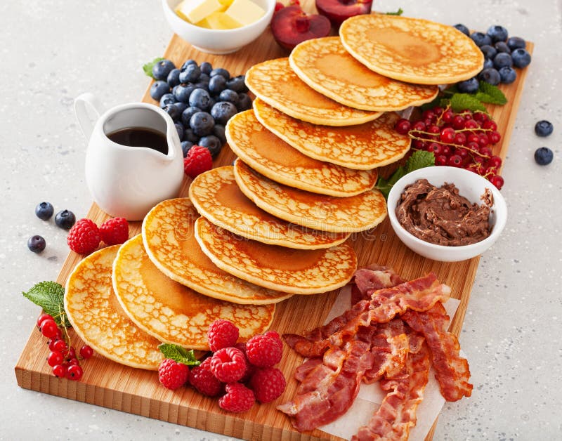 American Pancake Board with Bacon Berries Maple Syrup Butter Stock Photo Image of chocolate