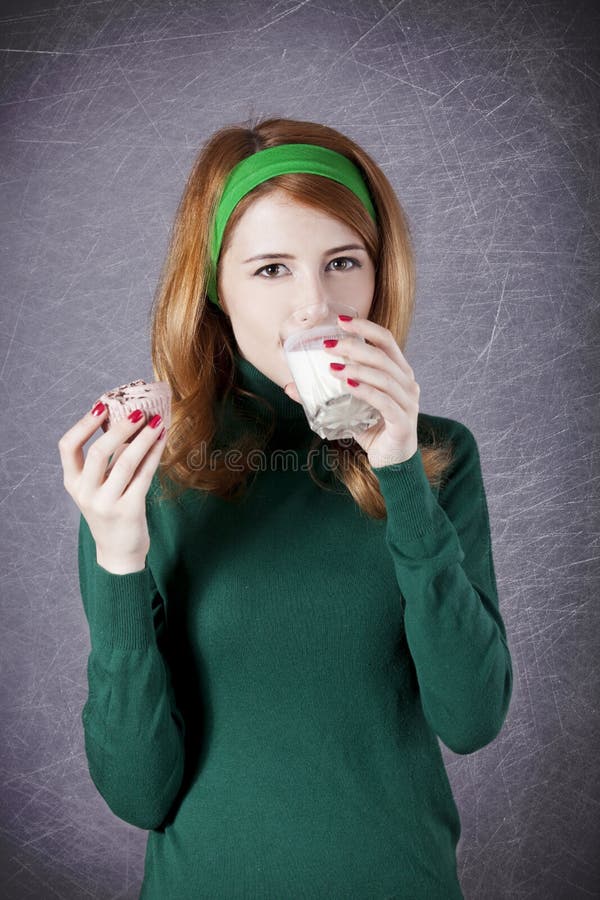 American Redhead Girl with Milk and Cake. Stock Image Image of