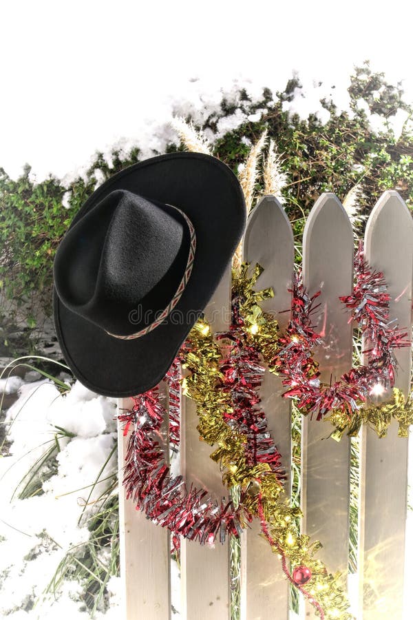 American West Rodeo Cowboy Hat on Christmas Fence