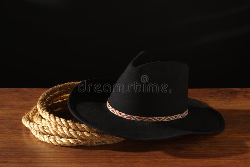 American West Rodeo Cowboy Hat and Ranching Rope