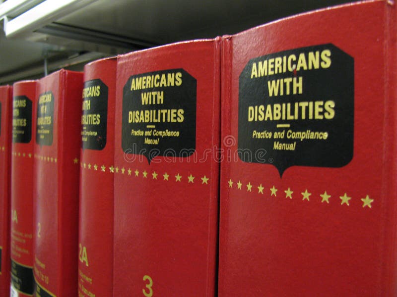 Americani con i libri di Legge di inabilità (ADA)