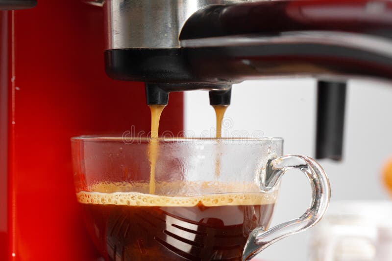 Americano Coffee Pouring from Home Coffee Machine Stock Photo Image