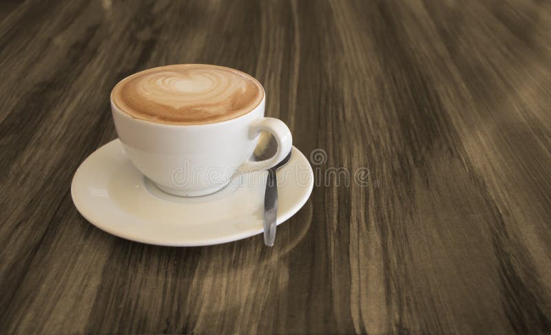 Americano de la taza del café del café del capuchino fotos de archivo libres de regalías Americano de la taza del café del café del capuchino fotos de archivo libres de regalías