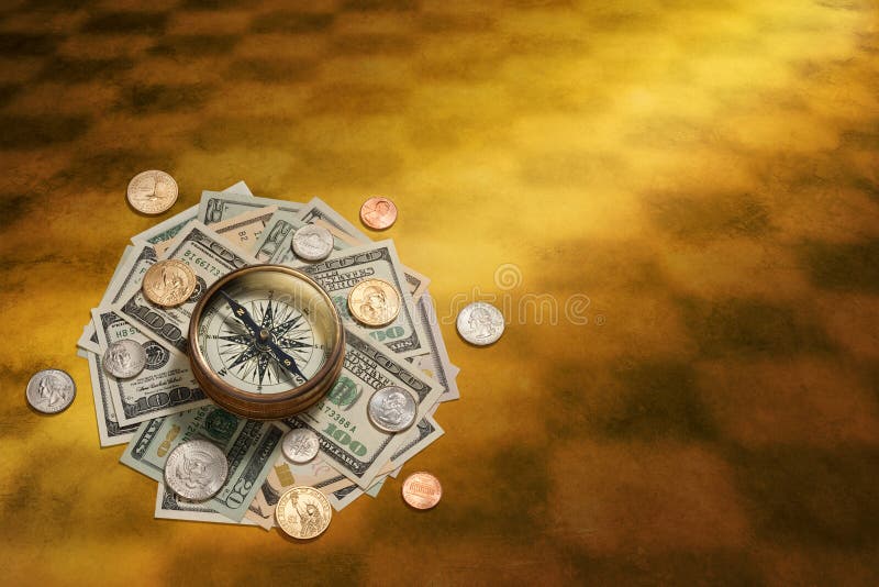 A compass on American money with an abstract background. A compass on American money with an abstract background