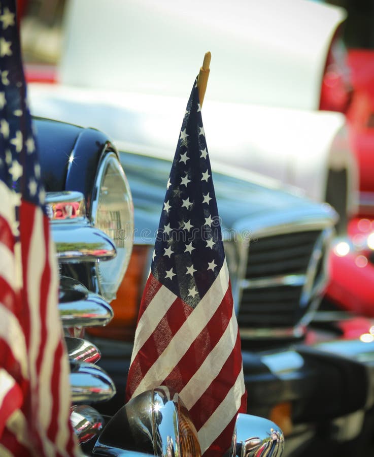 American Flags and Chrome at a Vintage Car Show, a Fourth of July Tradition at the Plaza in Santa Fe, New Mexico. American Flags and Chrome at a Vintage Car Show, a Fourth of July Tradition at the Plaza in Santa Fe, New Mexico.