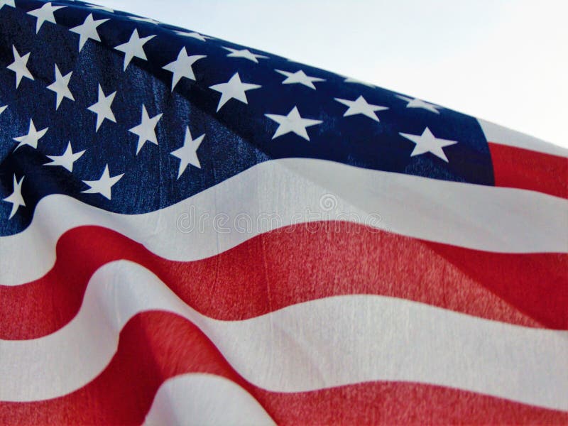 Amerikanska flaggan som vinkar i vind arkivfoton Amerikanska flaggan som vinkar i vind arkivfoton