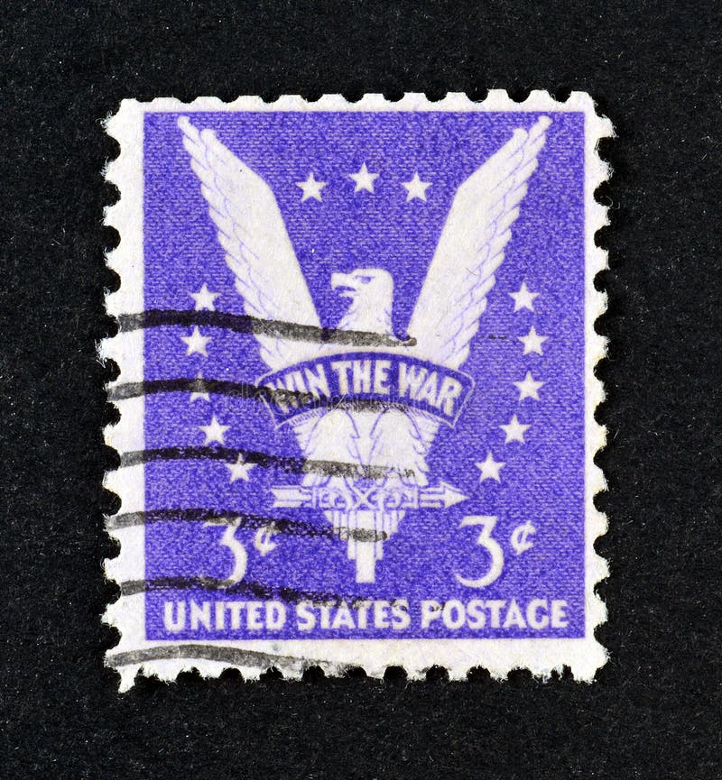 Cancelled postage stamp printed by USA, that shows American Eagle, Win the War Issue, circa 1942. Cancelled postage stamp printed by USA, that shows American Eagle, Win the War Issue, circa 1942.