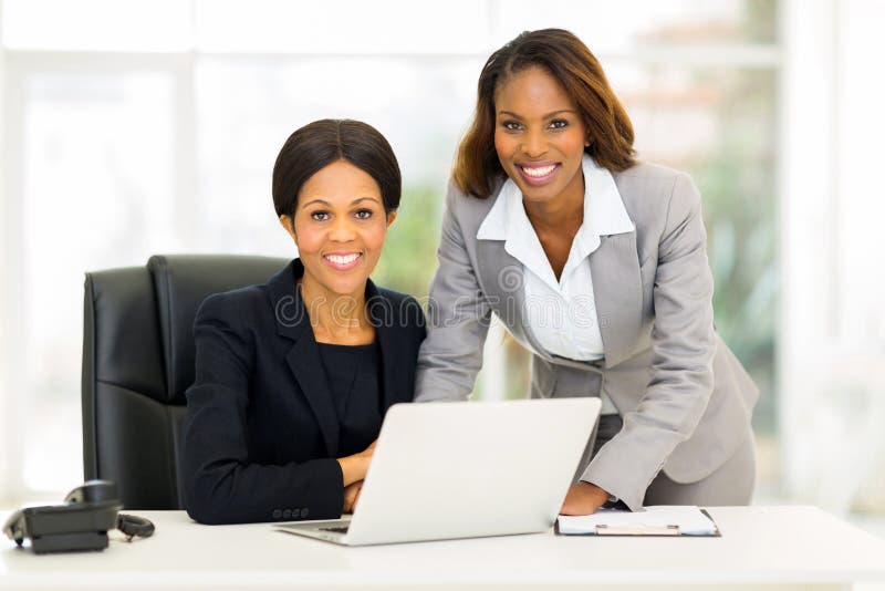 Portrait of beautiful african american business women in office. Portrait of beautiful african american business women in office