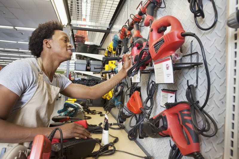 African American men working in an electronics store. African American men working in an electronics store