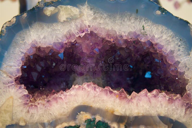 Amethyst crystal in a cave royalty free stock photography Amethyst crystal in a cave royalty free stock photography