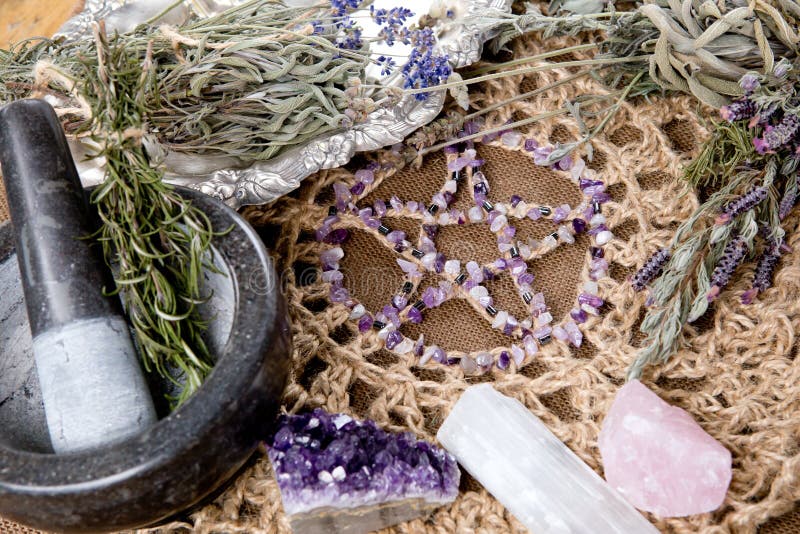 Amethyst crystal Pentagram with dried herb bundles, mortar and pestle on crotchet jute altar cloth - with selenite and rose quartz crystlas