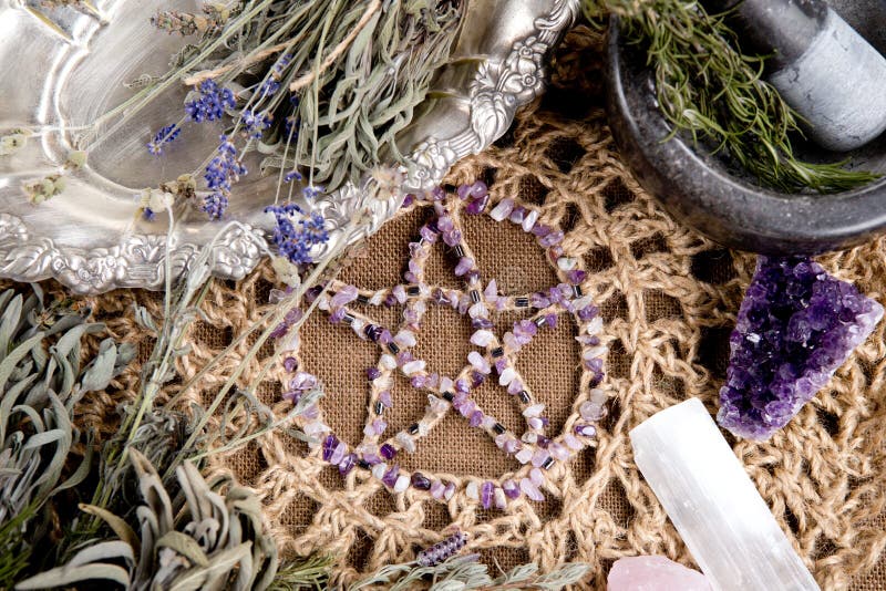 Amethyst crystal Pentagram with dried herb bundles, mortar and pestle on crotchet jute altar cloth - with selenite and rose quartz crystlas