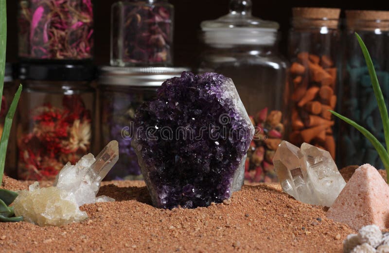 Amethyst Stone and Quartz Crystals on Australian Red Sand Stock Image