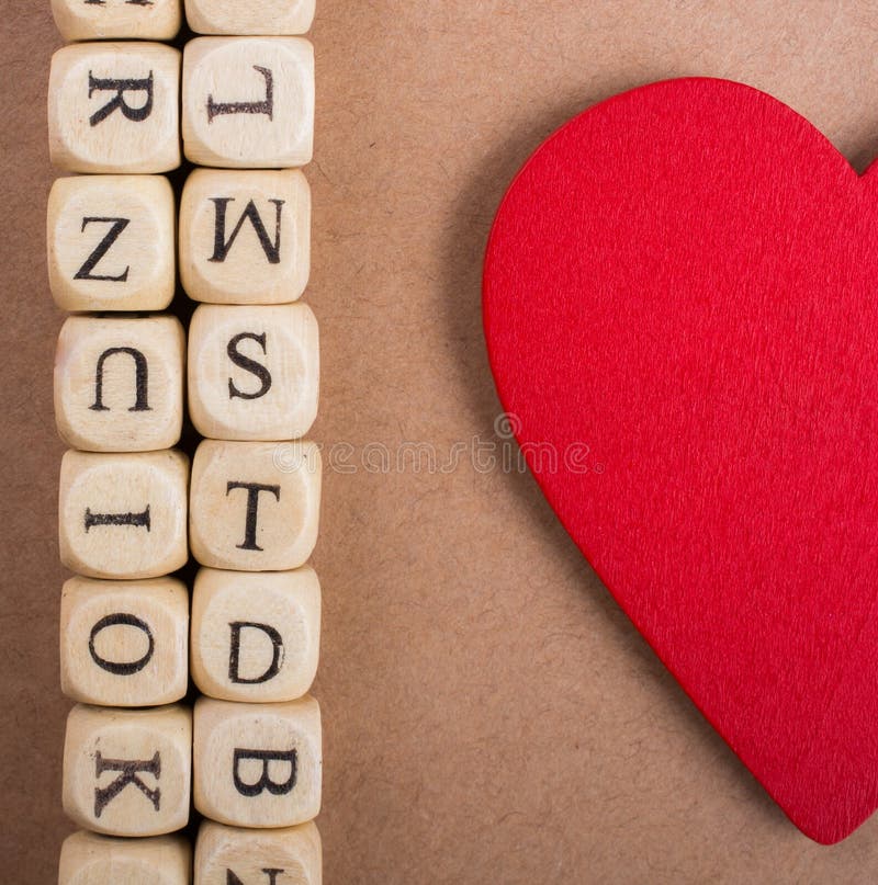 Ami l'icona e segni i cubi con lettere del fatto di di legno fotografia stock Ami l'icona e segni i cubi con lettere del fatto di di legno fotografia stock