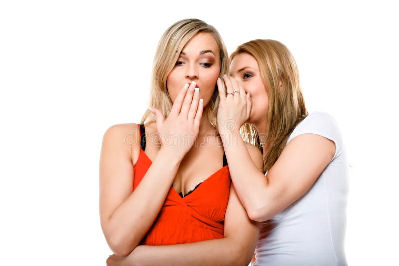 Amigos del cotilleo, dos mujeres que comparten un secreto imagenes de archivo Amigos del cotilleo, dos mujeres que comparten un secreto imagenes de archivo