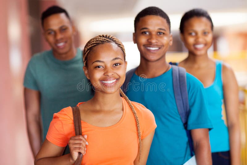 Beautiful african college girl with friends on campus. Beautiful african college girl with friends on campus
