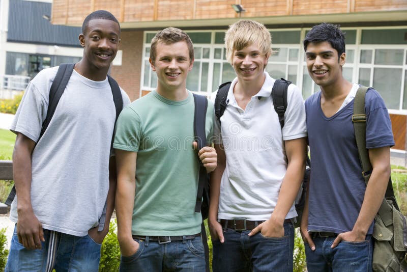 Male college friends on campus. Male college friends on campus.