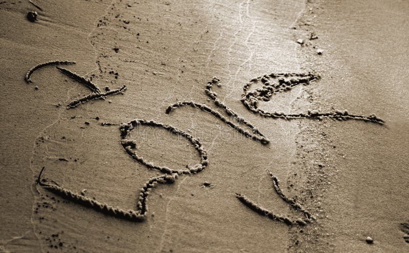 Download Amo U alla spiaggia fotografia stock. Immagine di lettera - 205584