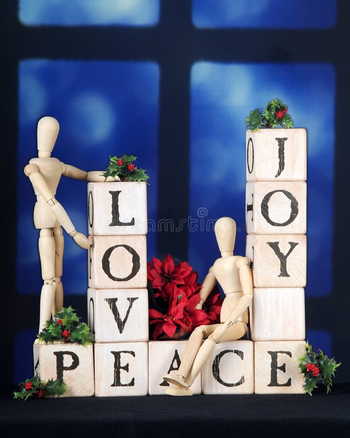 Amor, alegría, y paz de la Navidad foto de archivo libre de regalías Amor, alegría, y paz de la Navidad foto de archivo libre de regalías