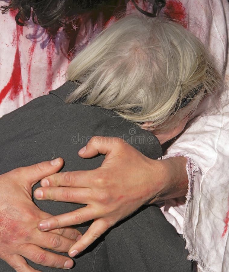 Jesus hands hugging an old woman. Jesus hands hugging an old woman.