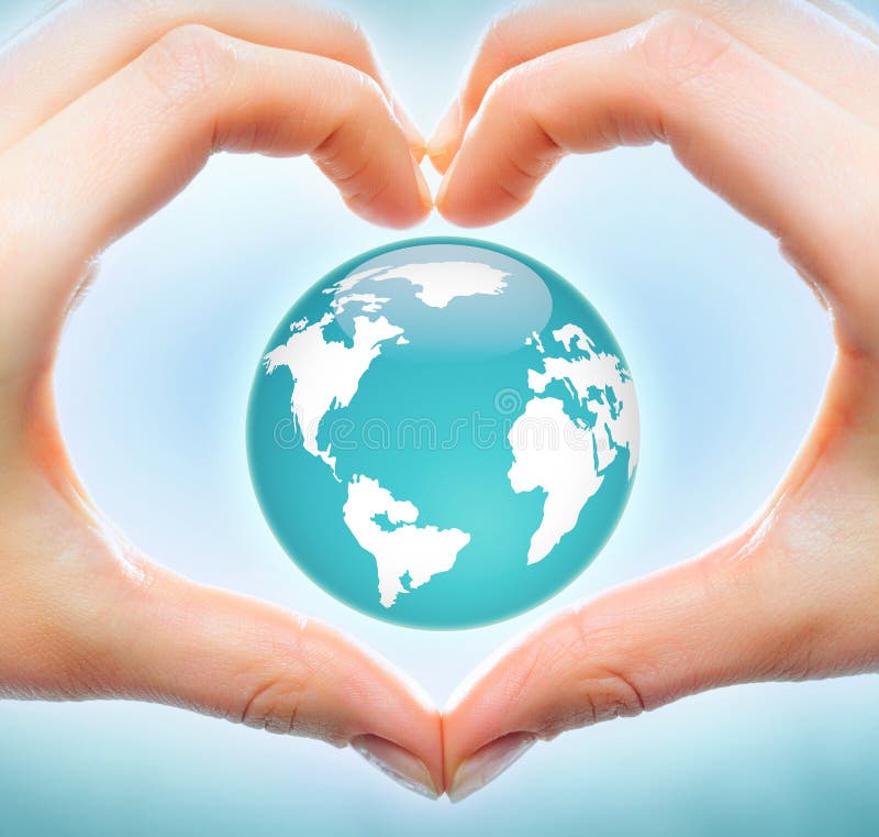 Creative image of earth model inside heart made up of human hands. Creative image of earth model inside heart made up of human hands