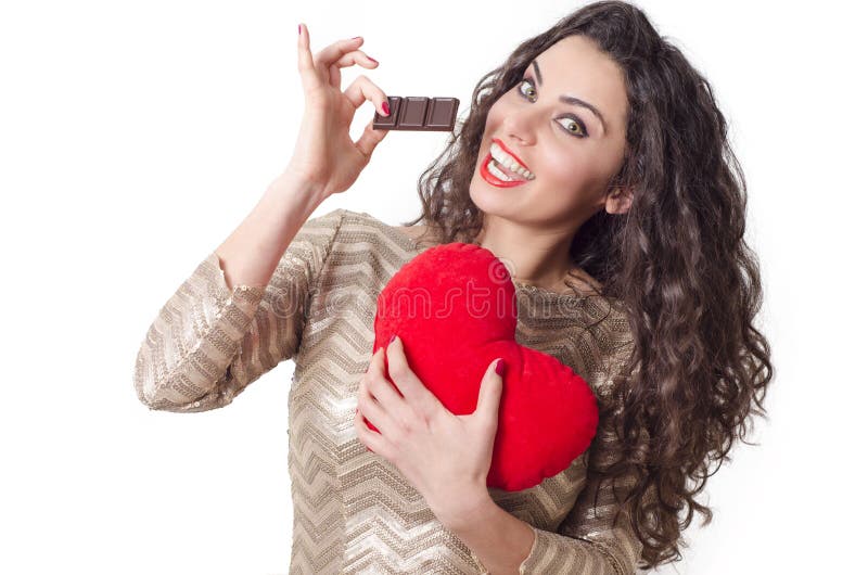 Amori svegli della giovane donna per mangiare concetto del cioccolato fotografia stock Amori svegli della giovane donna per mangiare concetto del cioccolato fotografia stock