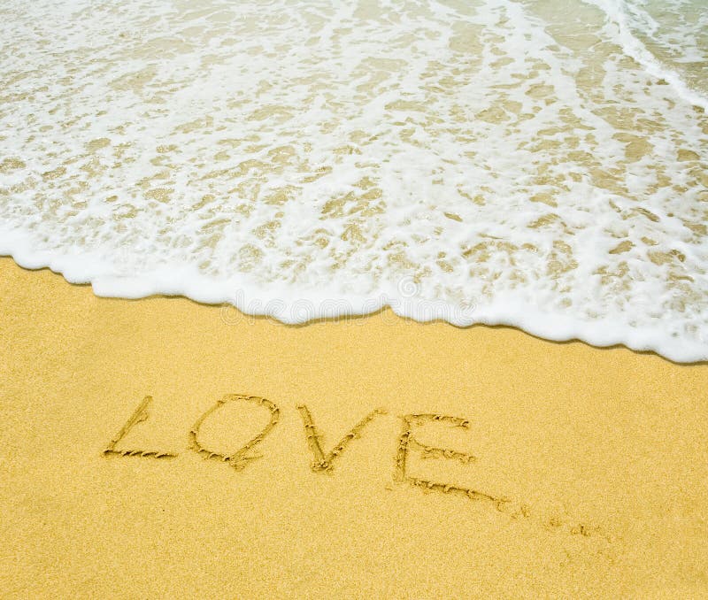 Love written in the sandy beach. Love written in the sandy beach