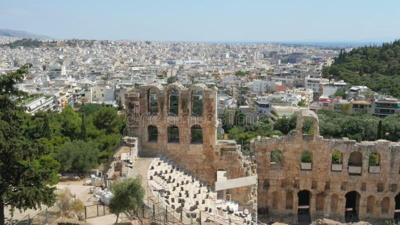 Amphitheatre in Acropolis with Athens city view, Greece, 4k