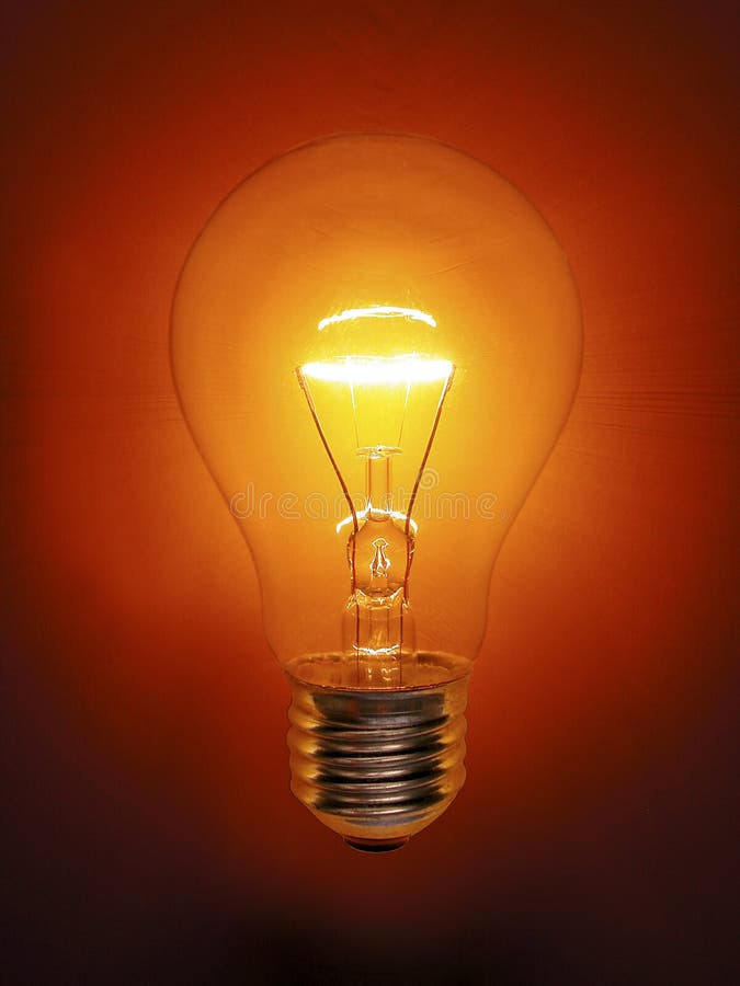 Ampoule orange image stock. Image du idée, glace, électricité 4974673