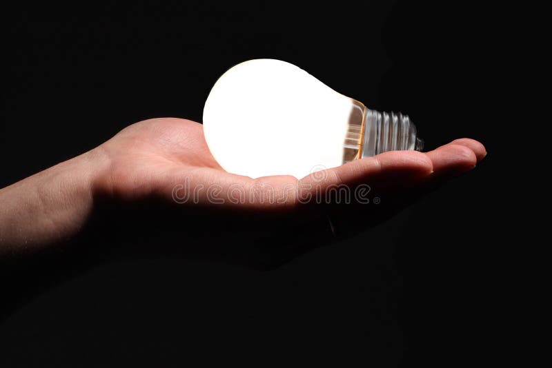 Ampoule dans une main photo stock. Image du prise, closeup 23025666