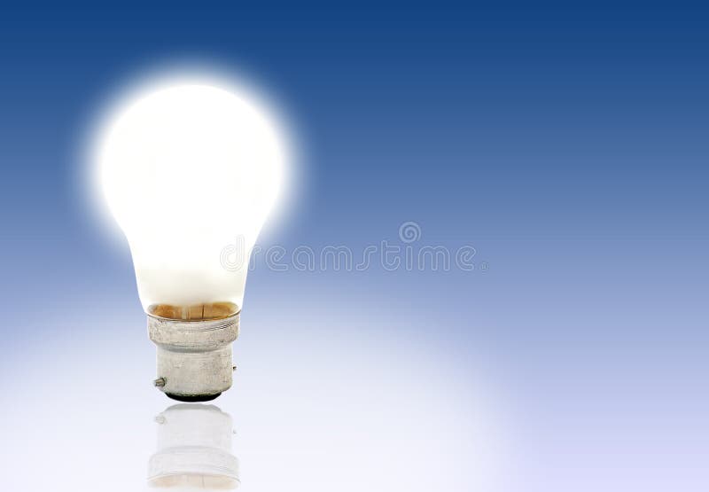 Ampoule sur le bleu de diplômé photo stock Ampoule sur le bleu de diplômé photo stock