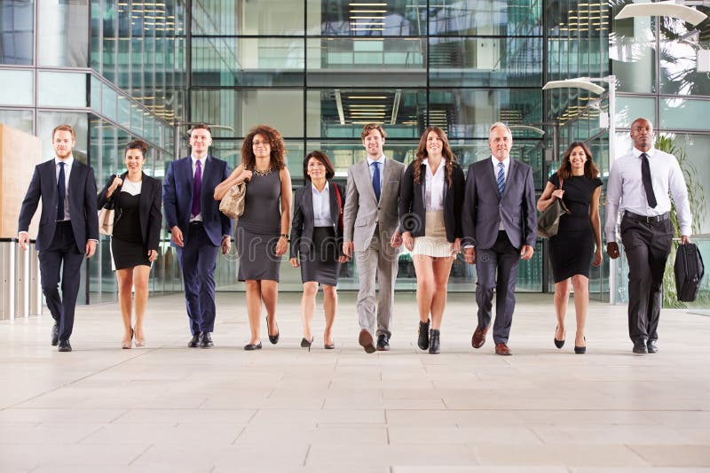 Large group of business people in lobby of a big business. Large group of business people in lobby of a big business