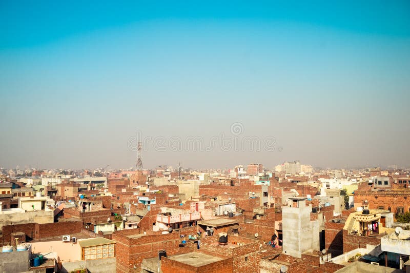 Amritsar, India. Downtown cityscape with top view on skyscrapers Image at sunset