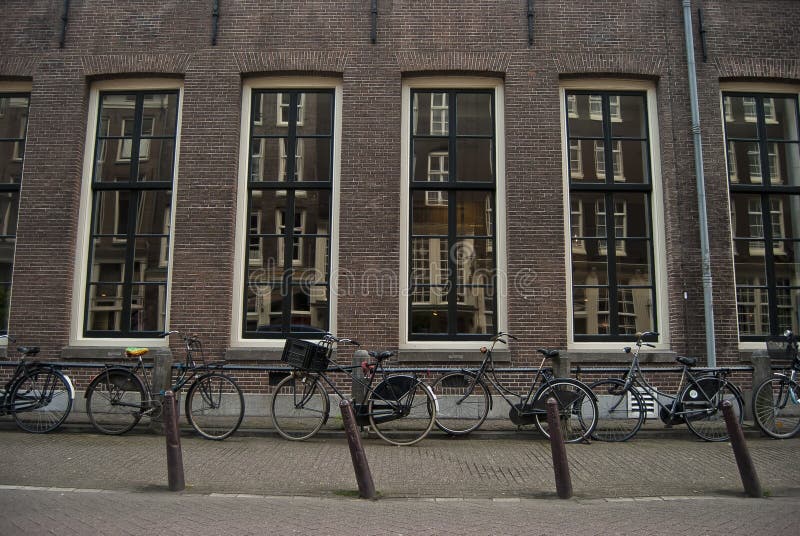 Amsterdam bikes at sidewalk
