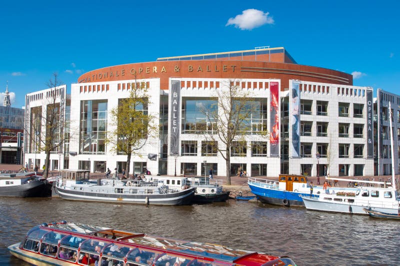 Amsterdam-April 30: Dutch National Opera & Ballet with boats along the bankon April 30,2015.