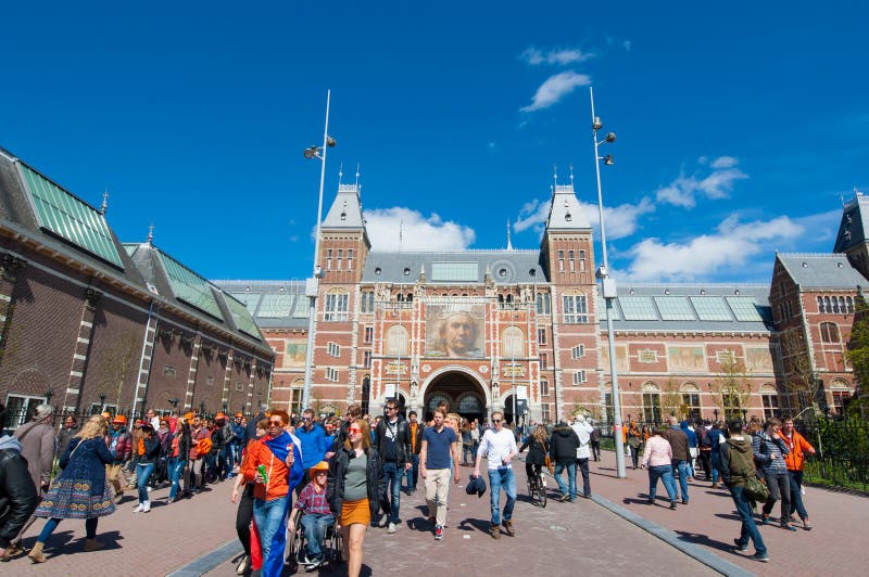 AMSTERDAM-APRIL 27: The Rijksmuseum during King s Day, crowd of people go to Museumplein on April 27, 2015.