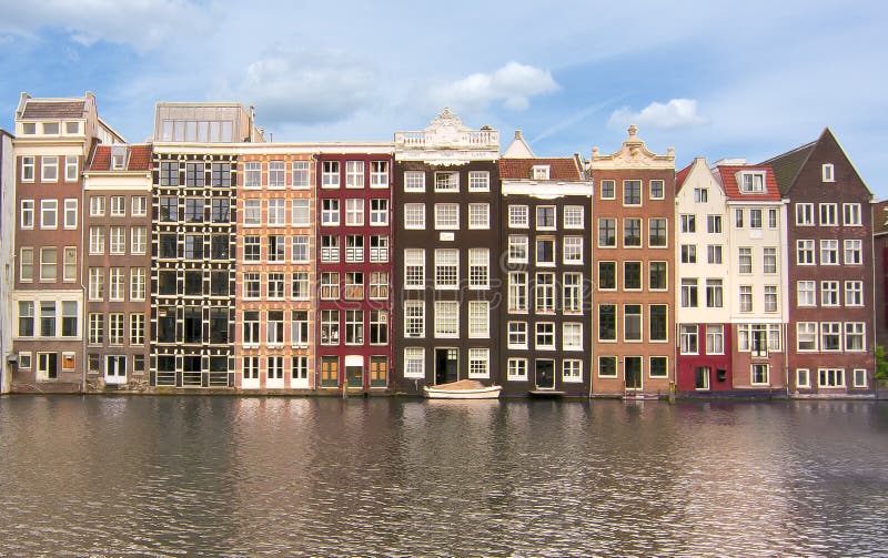 Amsterdam architecture and Damrak canal, Netherlands stock image Amsterdam architecture and Damrak canal, Netherlands stock image