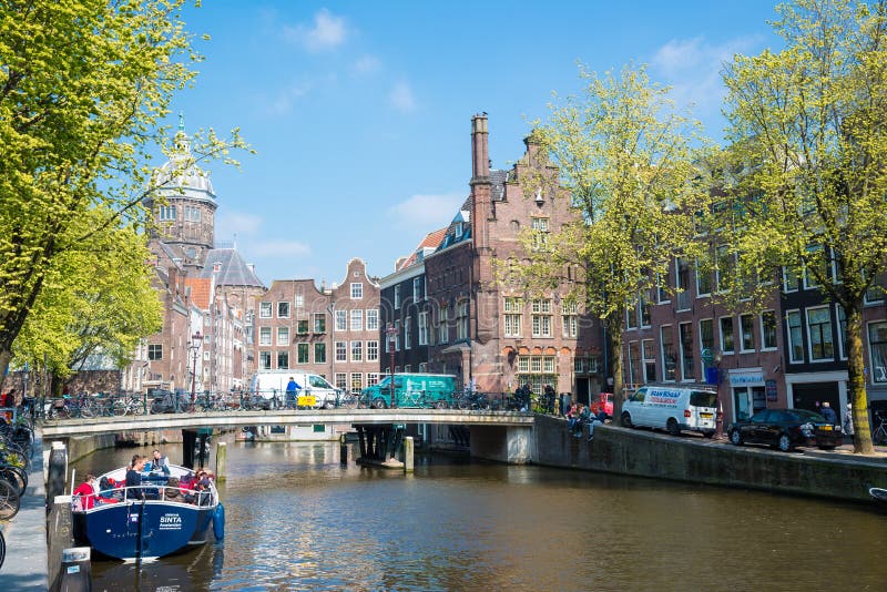 Amsterdam canals with bridges, boats and typical Dutch houses, Netherlands. royalty free stock photo Amsterdam canals with bridges, boats and typical Dutch houses, Netherlands. royalty free stock photo