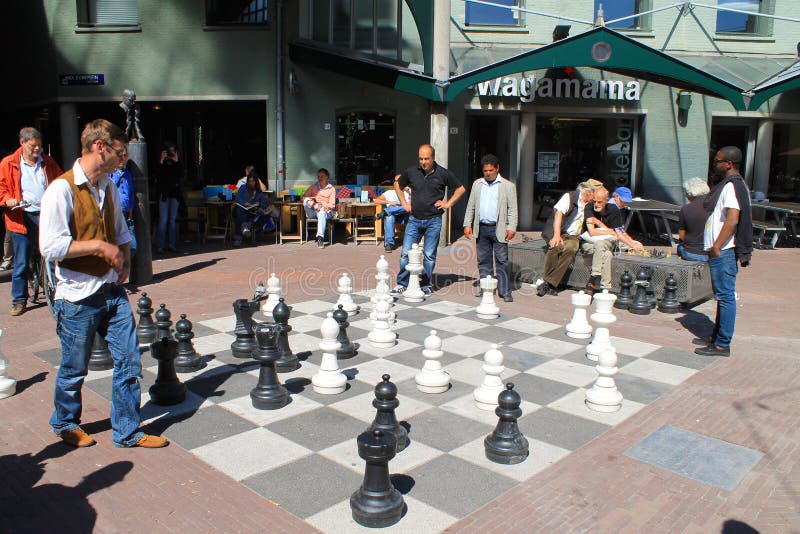 Big street chess pieces stock image. Image of large - 191891493