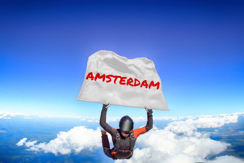 Amsterdam. Flag in Skydiving. People in Free Fall.Teampleat Skydiver