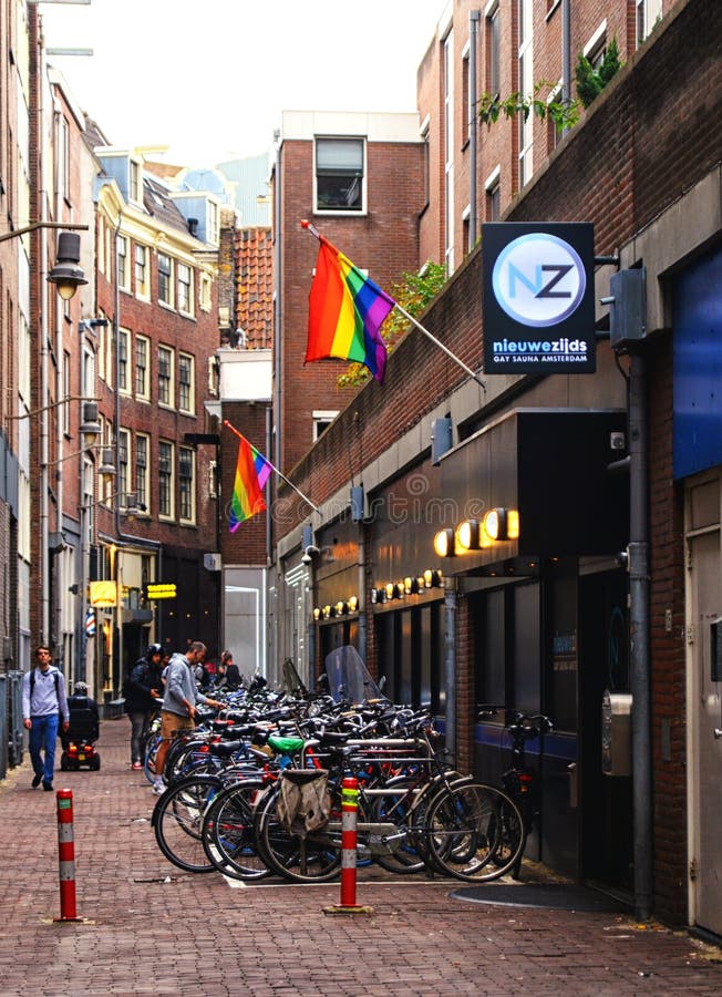 Amsterdam - 09/15/2019: Beautiful Little Traditional Houses and a Gay Sauna  with the LGBT Symbol in Amsterdam. LGBT F Editorial Stock Image - Image of  houses, 09152009: 181381154