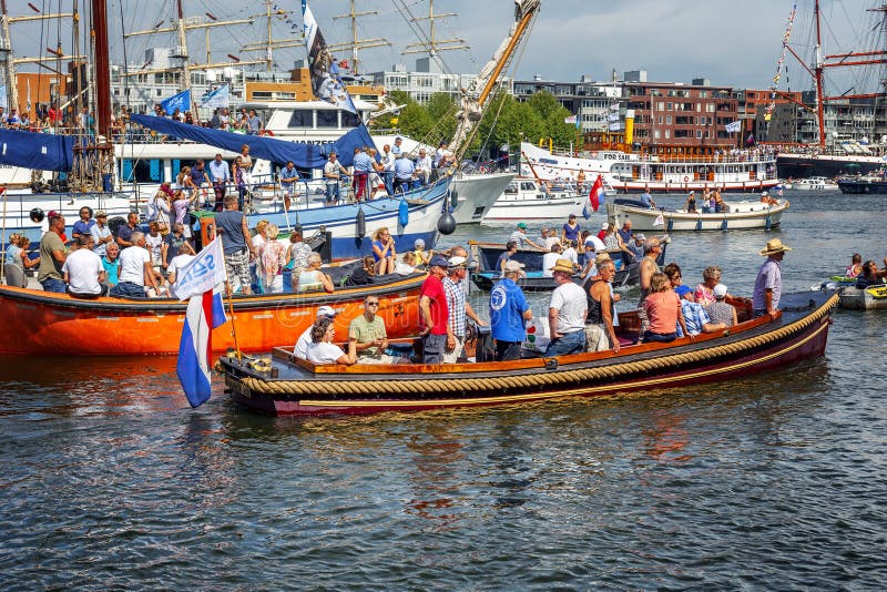Amsterdam, Netherlands, 08/22/2015: Sail Amsterdam festival. Boats and ships on the canals of the city. Horizontal royalty free stock photos Amsterdam, Netherlands, 08/22/2015: Sail Amsterdam festival. Boats and ships on the canals of the city. Horizontal royalty free stock photos