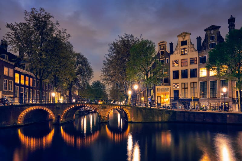 Amterdam Canal, Bridge and Medieval Houses in the Evening Stock Image ...